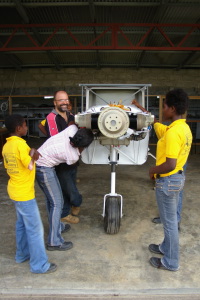 jonathan_and_patricia_showing_the_avtech_students_at_kpong_airfield_in_ghana_the_new_air_ambulance_zenith_801_engine